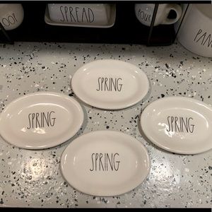 Four Rae Dunn small oval SPRING plates